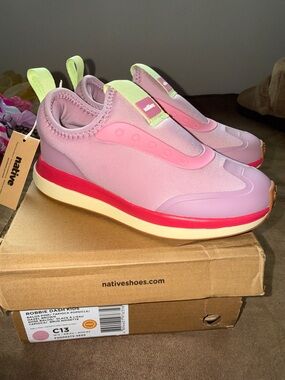 Native Kids Slip-On Sneakers in Pink with Neon Yellow Pull Tabs